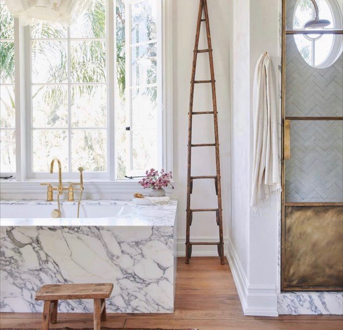 Working on a bathroom renovation and trying to decide if we should do wood floors or marble floors. What do you guys think!? 👉🏻 swipe for some inspo &amp; 👇🏻 leave your thoughts in the comments below!! 
#bathroomrenovation #bmid #interiordesign 