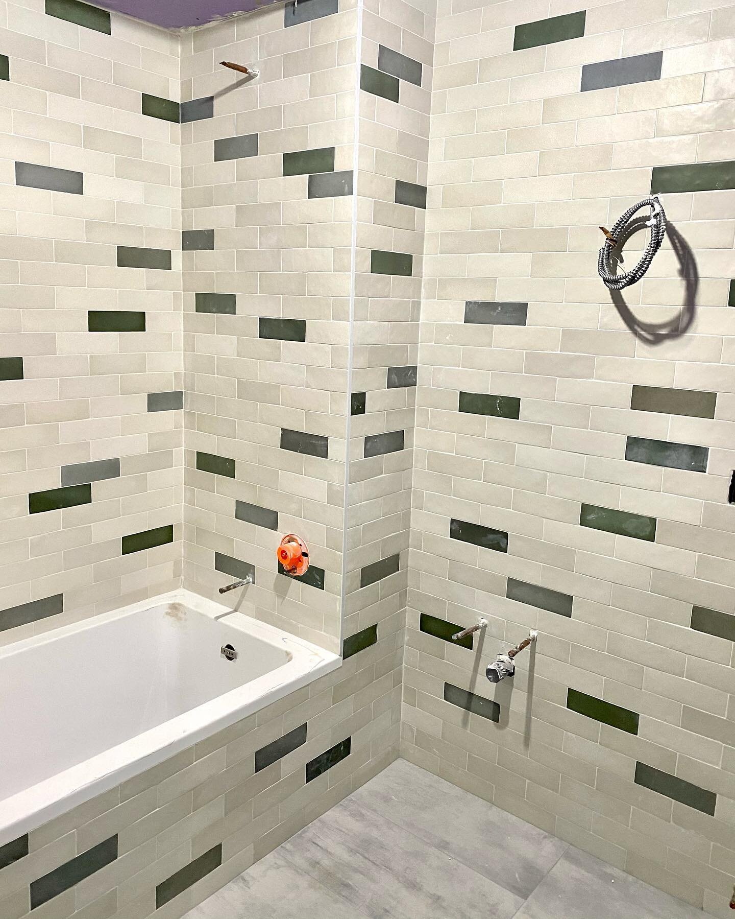 Just checked in on our Bushwick rental project. The design intent is industrial-modern with pops of color. We selected off white subway tiles with lots of variation and threw in random pops of green and blue and a fresh blue porcelain tile for the fl